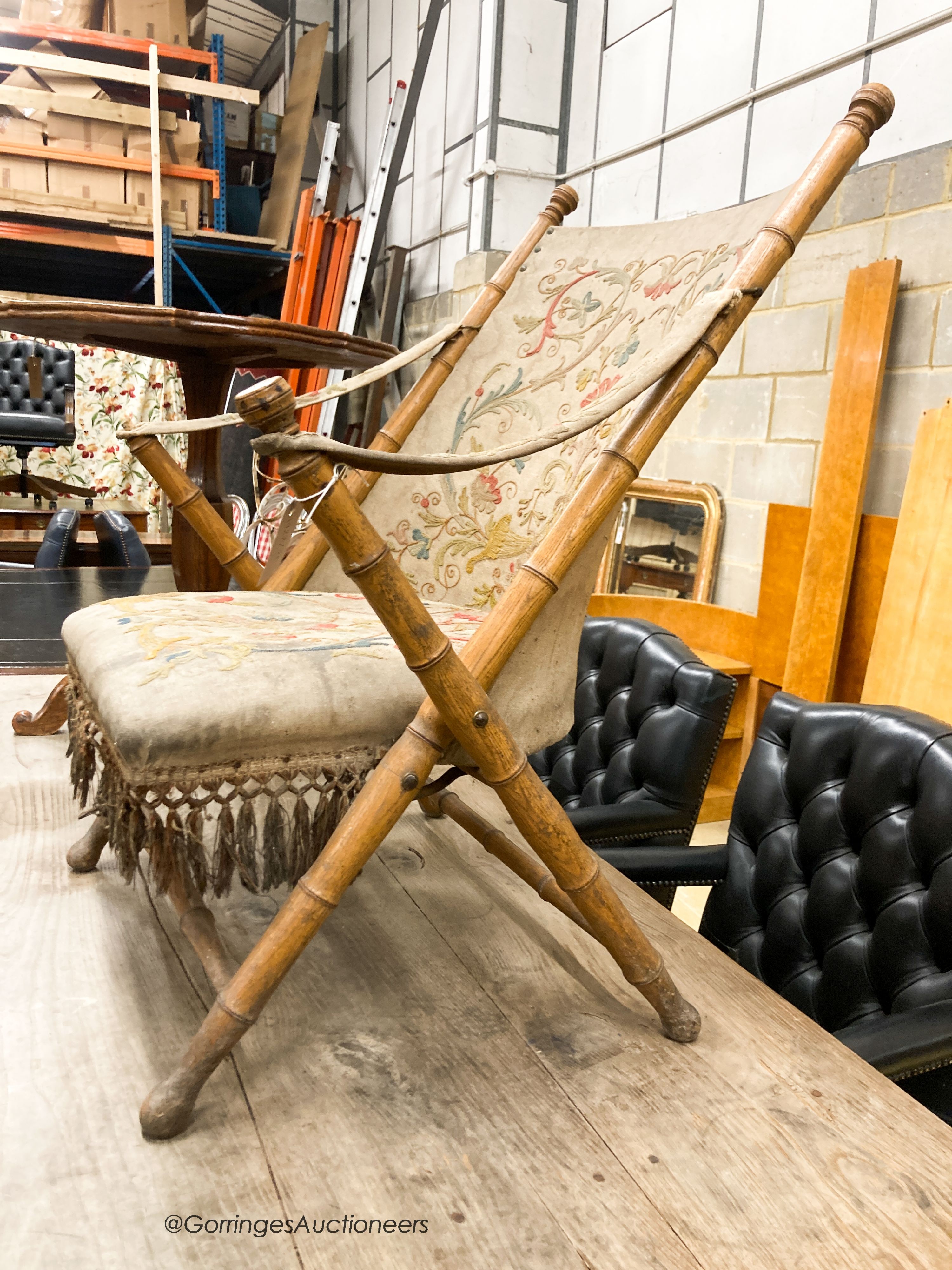 A Victorian faux bamboo folding chair with tapestry upholstery, W.66cm D.50cm H.90cm